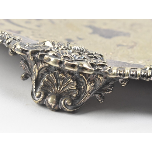 64 - A large late 19th / early 20th century High Victorian silver plated ornate serving tray. The tray ha... 