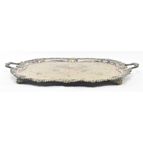 64 - A large late 19th / early 20th century High Victorian silver plated ornate serving tray. The tray ha... 