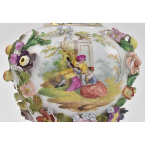 71 - Carl Thieme, Germany - a pair of continental late 19th century hand painted fine bone china lidded u... 