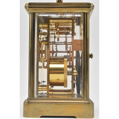 84 - Matthew Norman - an early 20th century Swiss made brass carriage clock. The clock of typical form, b... 