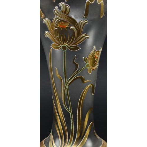 88 - An Art Nouveau late 19th century gilt & enamel clear glass vase. The vase having a folded ribbon... 