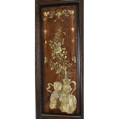 89 - A pair of early 20th century Chinoiserie mother of pearl inlaid oak panels. Each panel featuring fla... 