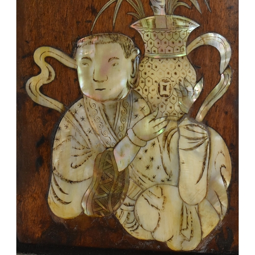 89 - A pair of early 20th century Chinoiserie mother of pearl inlaid oak panels. Each panel featuring fla... 