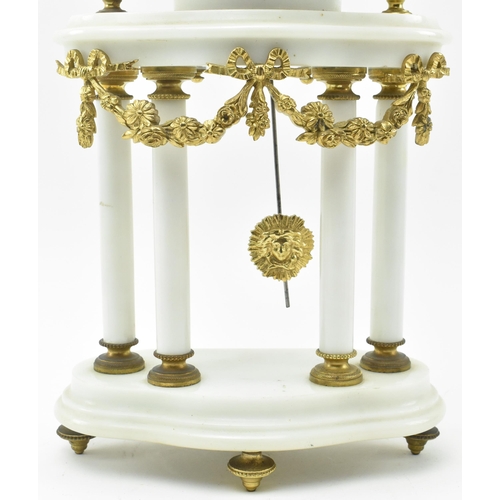 51 - Mougin - an early 20th century French two train white marble and gilt brass eight day movement porti... 