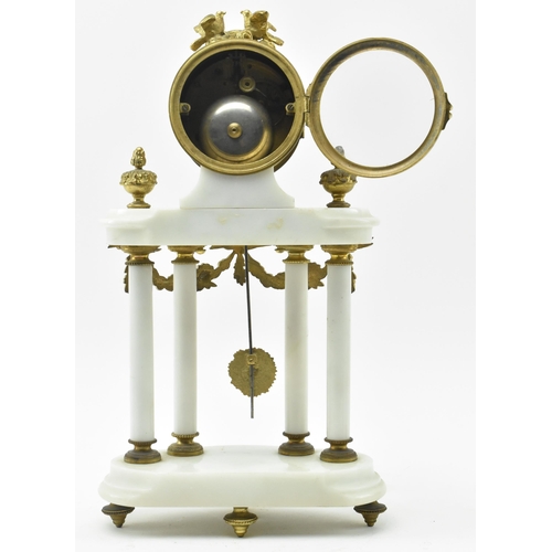 51 - Mougin - an early 20th century French two train white marble and gilt brass eight day movement porti... 