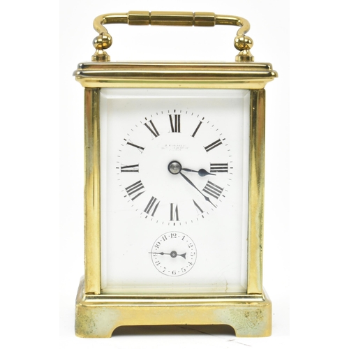 57 - J. Garnier, Paris - a French 19th century brass desk bell striking chime to base carriage clock. The... 