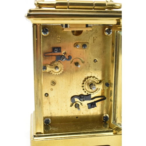 57 - J. Garnier, Paris - a French 19th century brass desk bell striking chime to base carriage clock. The... 