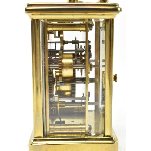 57 - J. Garnier, Paris - a French 19th century brass desk bell striking chime to base carriage clock. The... 