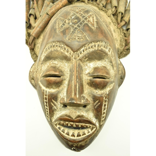 70 - Chokwe Tribe - Angola - a Central African tribal carved wood & sting bamboo wooden hair mask. Th... 