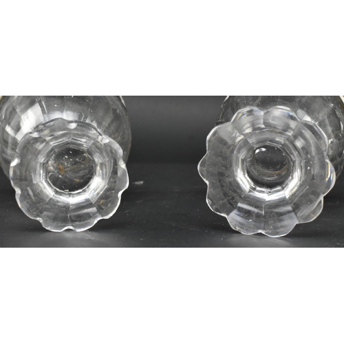 118 - A pair of early 19th century cut glass and silver plated condiment pots. Each with silver plated cir... 