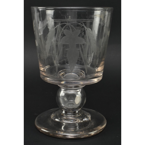 155 - An early 19th century hand etched cut glass commemorative ale glass / goblet with coin. The goblet h... 