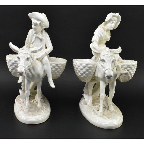 163 - A pair of Victorian 19th century Moore Bros white glazed ceramic figures of male & female on don... 