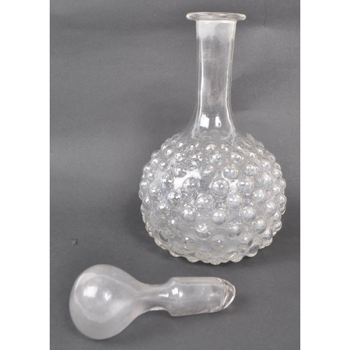 169 - A late 19th century Victorian hobnail blown glass decanter. The decanter hand-blown with clear bulb ... 