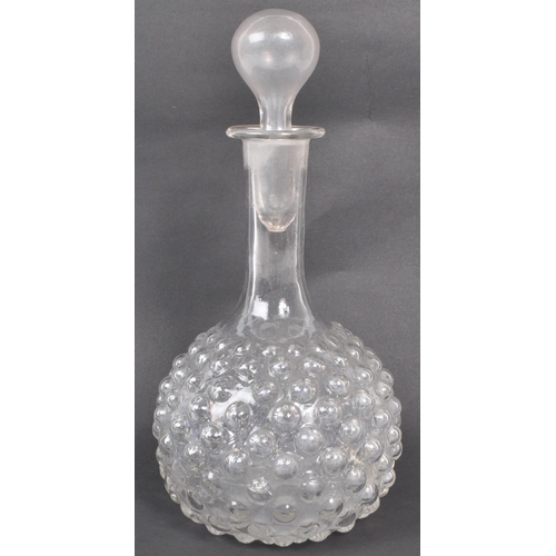 169 - A late 19th century Victorian hobnail blown glass decanter. The decanter hand-blown with clear bulb ... 