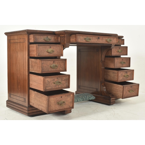 260 - Gillows of Lancaster - a Victorian mid 19th century figured walnut & leather top breakfront libr... 