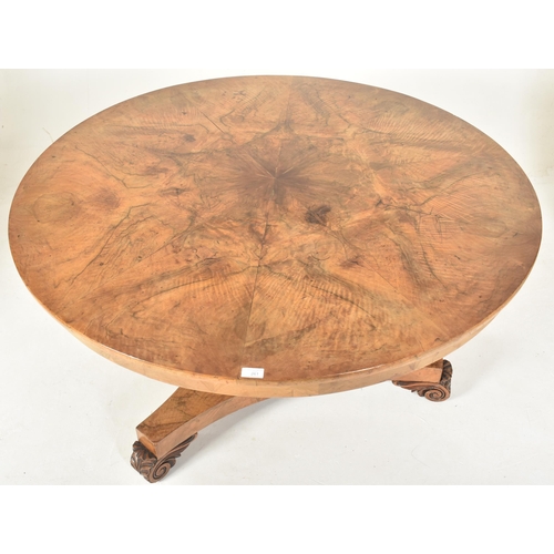 261 - An early 19th century burr walnut loo / breakfast tilt top table. The table having a circular tilt t... 