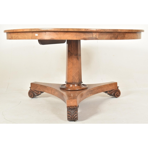 261 - An early 19th century burr walnut loo / breakfast tilt top table. The table having a circular tilt t... 