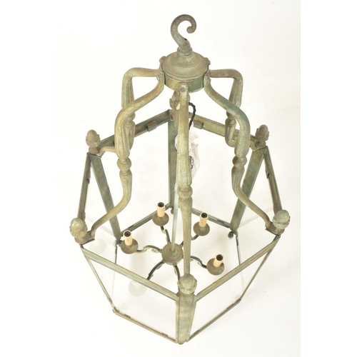 262 - A large patinated metal & glass farmhouse country home hexagonal ceiling porch lantern light. Th... 