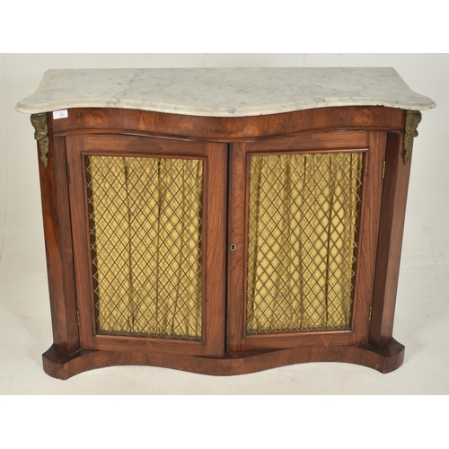 265 - A 19th century rosewood & lattice work marble top serpentine pier cabinet. The cupboard having a... 