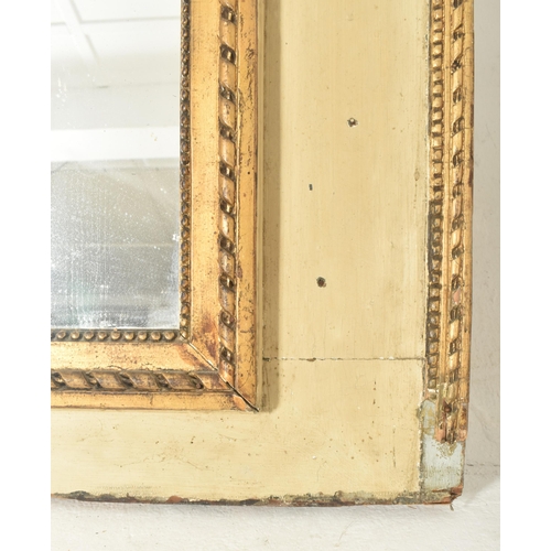 266 - A French Louis XVI style 19th century gilt painted wood Trumeau overmantel wall mirror. The mirror o... 