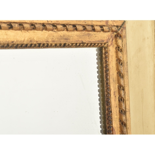 266 - A French Louis XVI style 19th century gilt painted wood Trumeau overmantel wall mirror. The mirror o... 