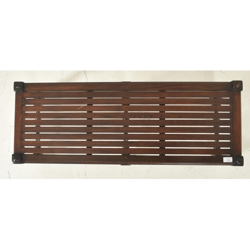 273 - A Victorian 19th century carved mahogany slatted luggage rack. The rack having a slatted rectangular... 