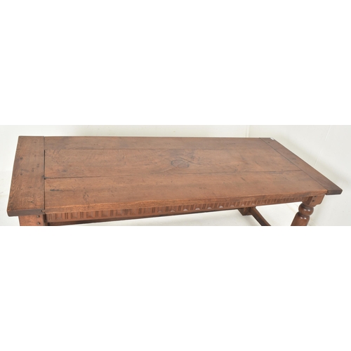 275 - A large 19th century solid oak refectory farmhouse dining table. The table having a rectangular top ... 