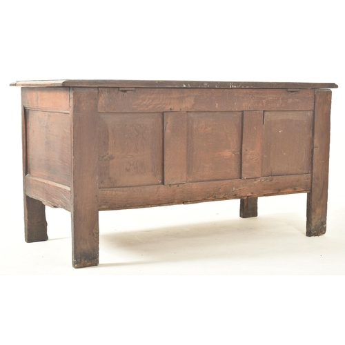 283 - An early 18th century carved oak blanket box / mule chest. The coffer having a three panelled hinged... 