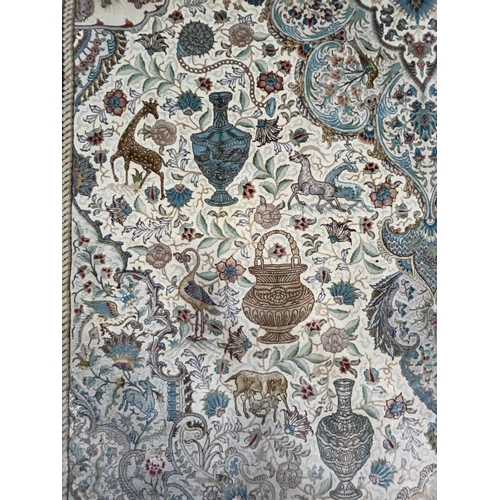 284 - A Persian Tabriz Zir Khaki hand woven wool & silk 60 raj floor carpet rug. The carpet having a c... 