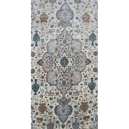 284 - A Persian Tabriz Zir Khaki hand woven wool & silk 60 raj floor carpet rug. The carpet having a c... 