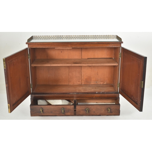 285 - A Regency early 19th century rosewood and brass inlaid front pier bookcase cabinet. The credenza hav... 