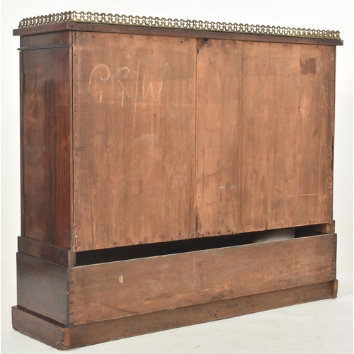 285 - A Regency early 19th century rosewood and brass inlaid front pier bookcase cabinet. The credenza hav... 