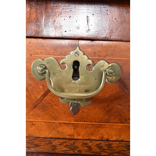 290 - A Queen Anne 18th century walnut chest of drawers. The chest having a chamfered edge straight top ov... 