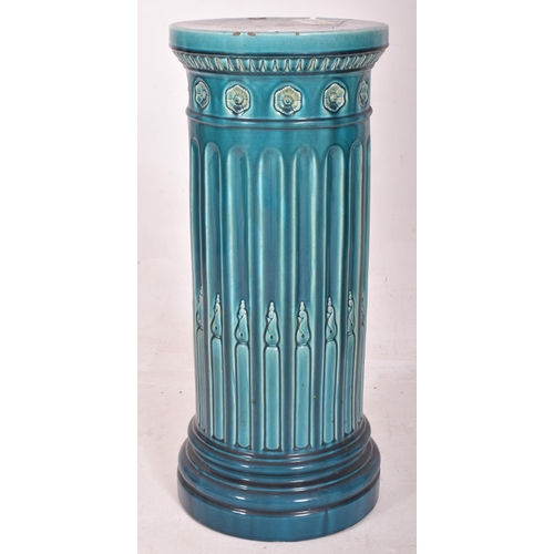 294 - Burmantofts Faience & Bretby, England - a 19th century green-blue glazed ceramic floor planter j... 