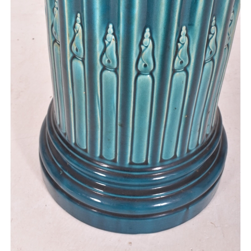 294 - Burmantofts Faience & Bretby, England - a 19th century green-blue glazed ceramic floor planter j... 