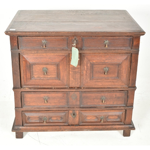 295 - A 17th century Commonwealth block fronted oak chest of drawers. The chest having a rectangular flare... 