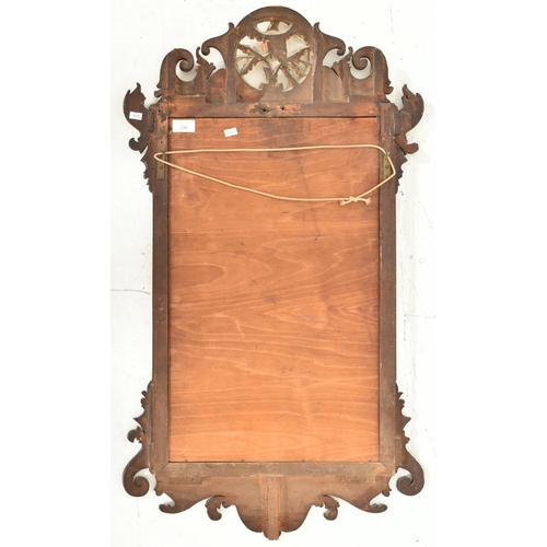 296 - A Victorian 19th century gilt wood & mahogany pier wall hanging mirror. The mirror having a scro... 