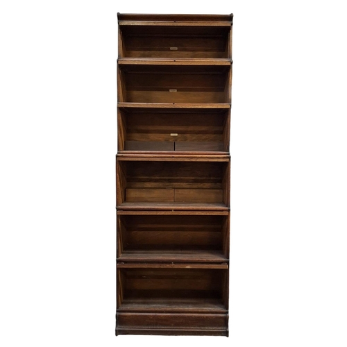 300 - Globe Wernicke, London - a large early 20th century oak six tier sectioned lawyers barristers bookca... 