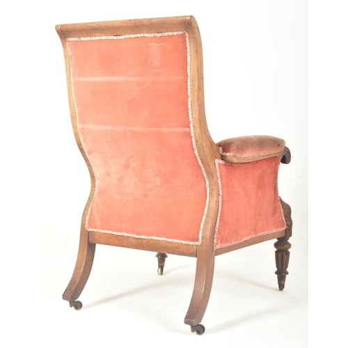 304 - A William IV early 19th century mahogany framed & velvet upholstered library armchair. The arm c... 