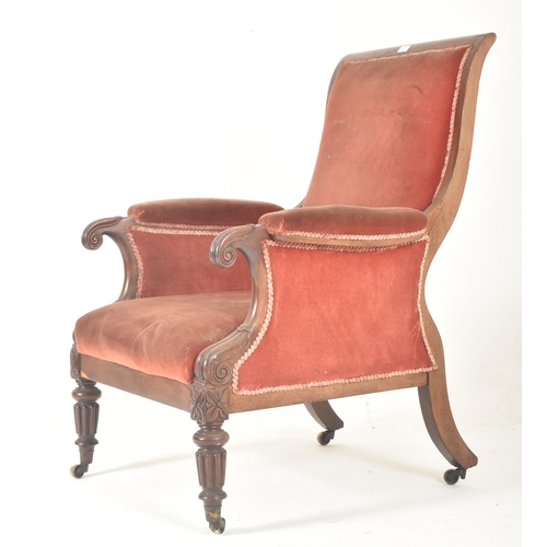 304 - A William IV early 19th century mahogany framed & velvet upholstered library armchair. The arm c... 