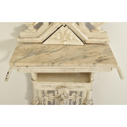 306 - A Victorian 19th century Coalbrookdale manner white painted cast iron hall umbrella stand. The stand... 