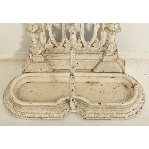 306 - A Victorian 19th century Coalbrookdale manner white painted cast iron hall umbrella stand. The stand... 