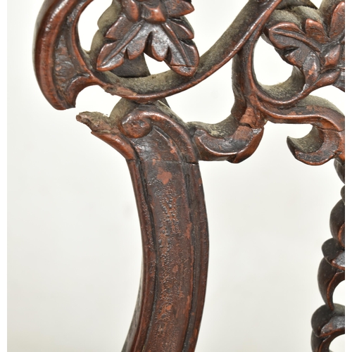 307 - A pair of Anglo-Colonial Indian 19th century carved hardwood chairs. Each chair having a scrolled ba... 