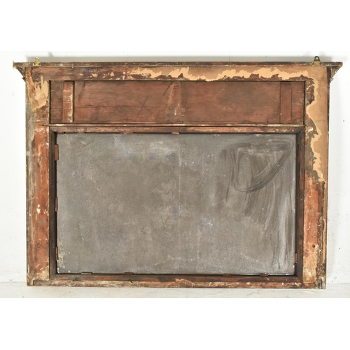 308 - A Regency early 19th century gilt wood & gesso worked overmantel mirror. The mirror having a fla... 