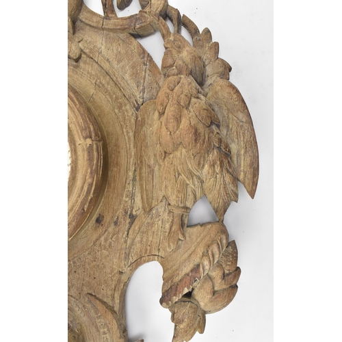 319 - A continental Black Forest early 20th century carved oak wall hanging clock. The clock having a deer... 