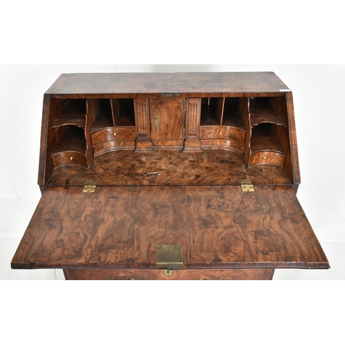 321 - A Queen Anne 18th century burr walnut writing bureau desk. The bureau chest having a drop down front... 