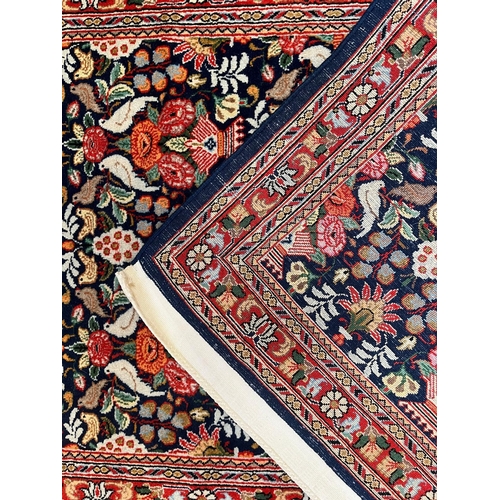 334 - A Persian Kashan pictorial wool floor carpet runner rug. The runner rug having a central cobalt blue... 