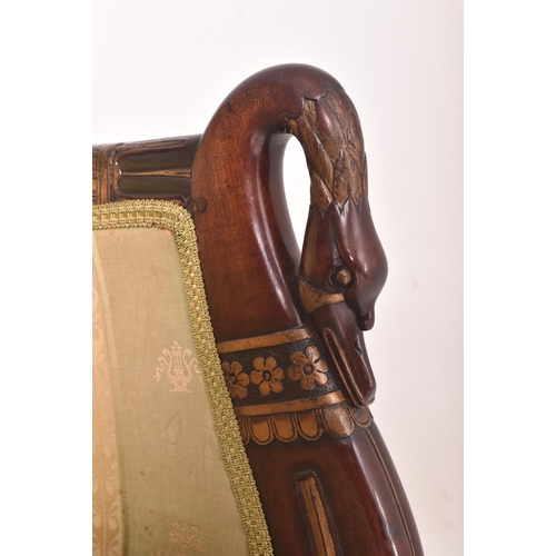 335 - A French Empire early 20th century, circa 1900s mahogany & gilt painted swan neck library armcha... 