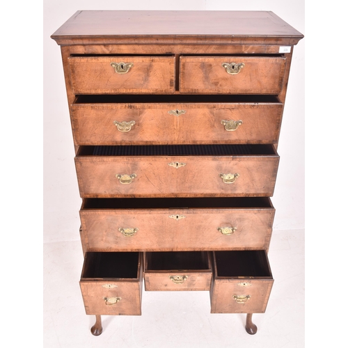 339 - A Queen Anne George III crossbanded flame mahogany chest of drawers on stand - tallboy. The chest ha... 