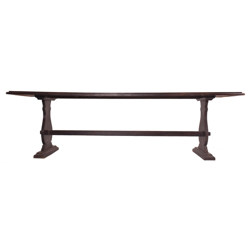 343 - A 17th century revival large 20th century oak refectory dining table. The table of elongated rectang... 